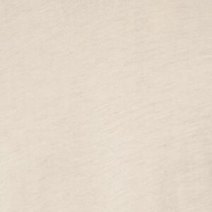 Close-up of a soft cream fabric texture, showcasing the material quality relevant to the Bella + Canvas 3001 Unisex Jersey Tee color options.